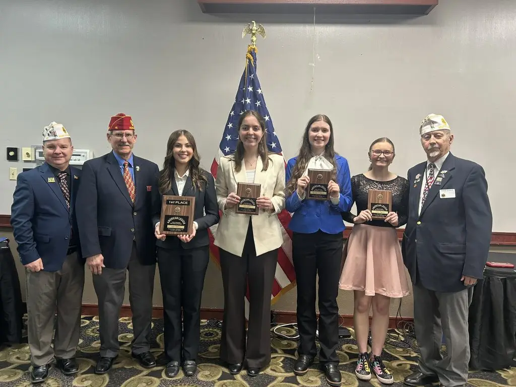 American Legion Oratorical Contest participants and organizers posing for a group photo.